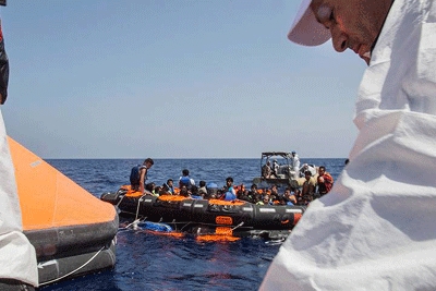 Search for migrants from overturned boat in Mediterranean goes on