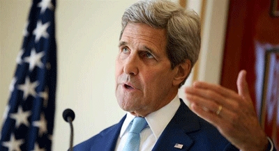 Kerry says U.S. will not accept restrictions in South China Sea