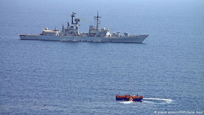 Italian navy: migrant ship sinks with scores dead and hundreds rescued
