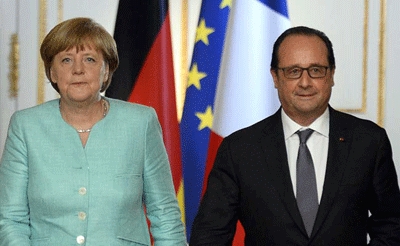 Hollande, Merkel 'to discuss EU migrant crisis on Monday'