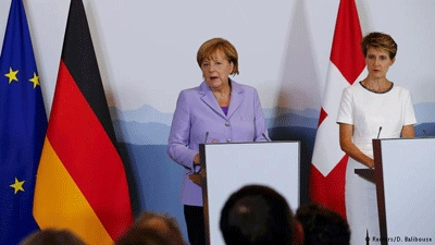 Chancellor Angela Merkel defends Germany's refugee policy as moral and legal