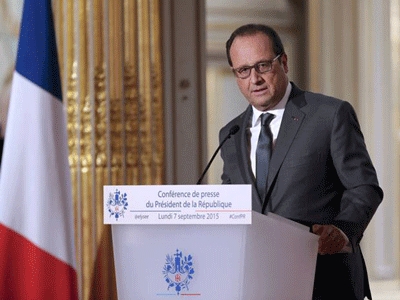 France accepts 24,000 refugees, prepares for airstrikes over Syria