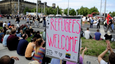 Thousands turn out in Europe to show support for migrants and refugees
