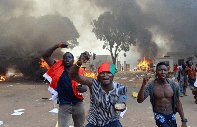 1 dead, scores hurt as protests spread after Burkina coup
