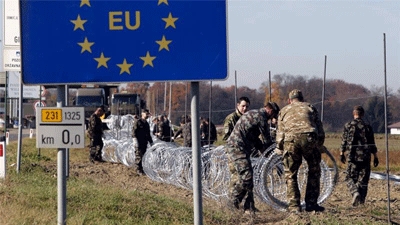 Slovenia starts erecting razor wire on Croatia border