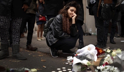 Shock turns to anger in Paris as death toll rises