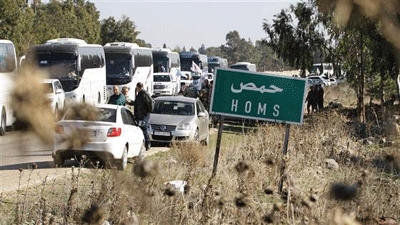 Syria rebels leave Homs following rare ceasefire deal