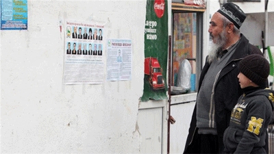 Tajikistan shaves 13,000 men's beards to end radicalism