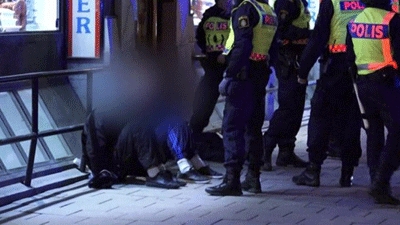 Sweden masked gang 'attacked migrants' in Stockholm