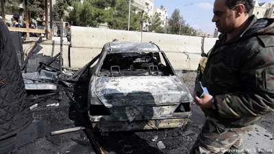 Car bomb explodes outside police club in Damascus, killing eight