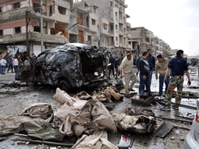 Watchdog: Syrian blasts kill 184 in worst single day of conflict