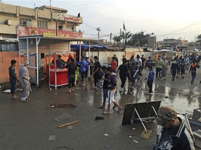 Twin Bombing Attacks in Baghdad Market Kill at Least 38