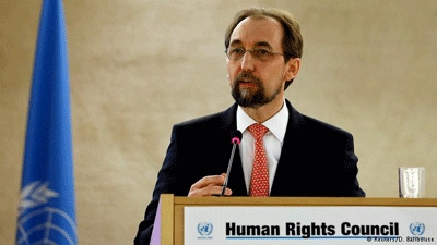 UN human rights chief slams 'race to repel' migrants