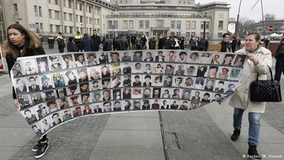 Former Bosnian Serb leader Karadzic found guilty of genocide, sentenced to 40 years