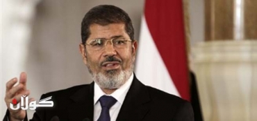 Egypt's Mursi in crisis talks with judges over reform