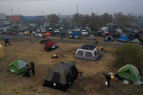 Number of missing in California fire soars past 1,000 as Trump set to visit