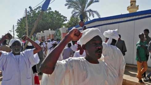 Sudan police confront protesters as Bashir rejects accusations