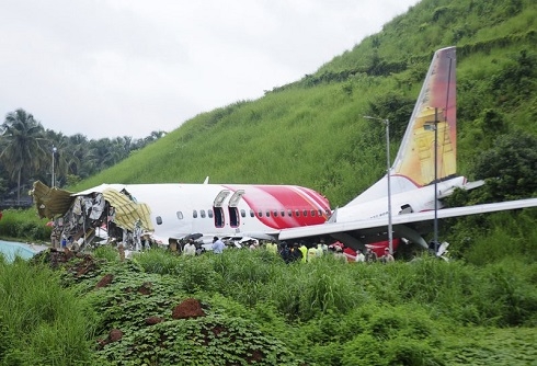 Indian plane skids off hilltop runway, cracks, killing 18