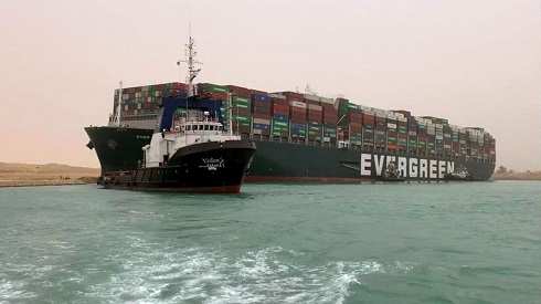 Giant ship blocks Egypt's Suez Canal after 'gust of wind' knocks it off course