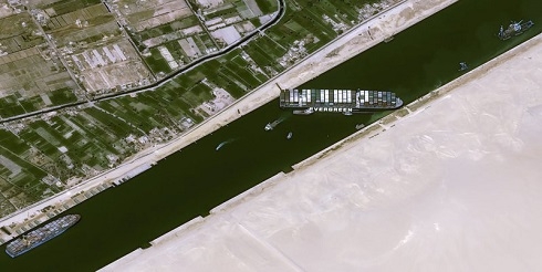 Egypt races to dislodge giant vessel blocking Suez Canal