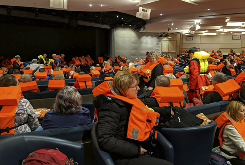 Tugs tow Norway cruise ship after 463 rescued; 17 injured