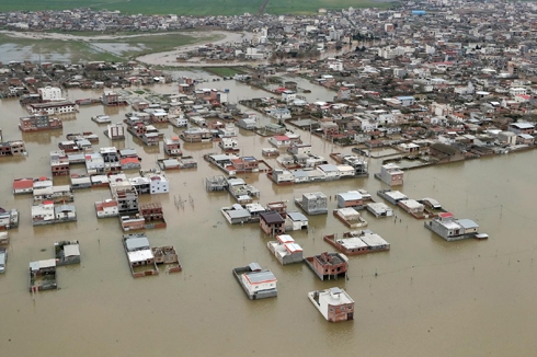 President Rouhani inspects flood damage in northern Iran