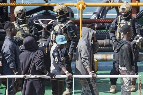 Self-defense or piracy? Debate after migrants hijack tanker