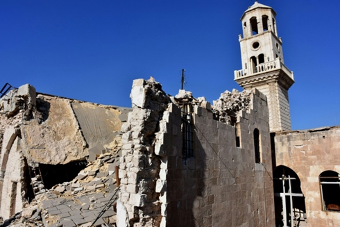 In Syria's Aleppo, restored Armenian church hosts first mass