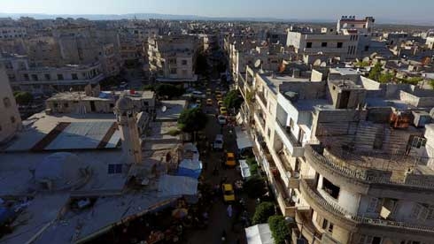 Syrian and Russian warplanes pound Idlib before talks: monitor