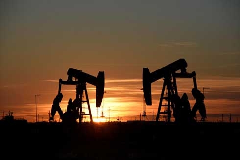 Oil slips on signs of rising supplies, economic slowdown jitters