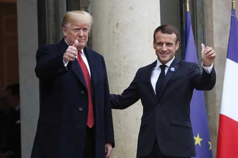 After testy tweet, Trump calls French president good friend