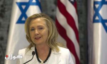 Clinton warns Iran on nukes