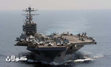 U.S. carrier in Gulf after Strait of Hormuz pass; EU readies ban on Iran oil imports