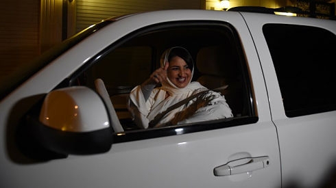 Saudi women behind the wheel smile as ban on female drivers end