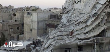 Syria conflict: Assad forces strike Homs